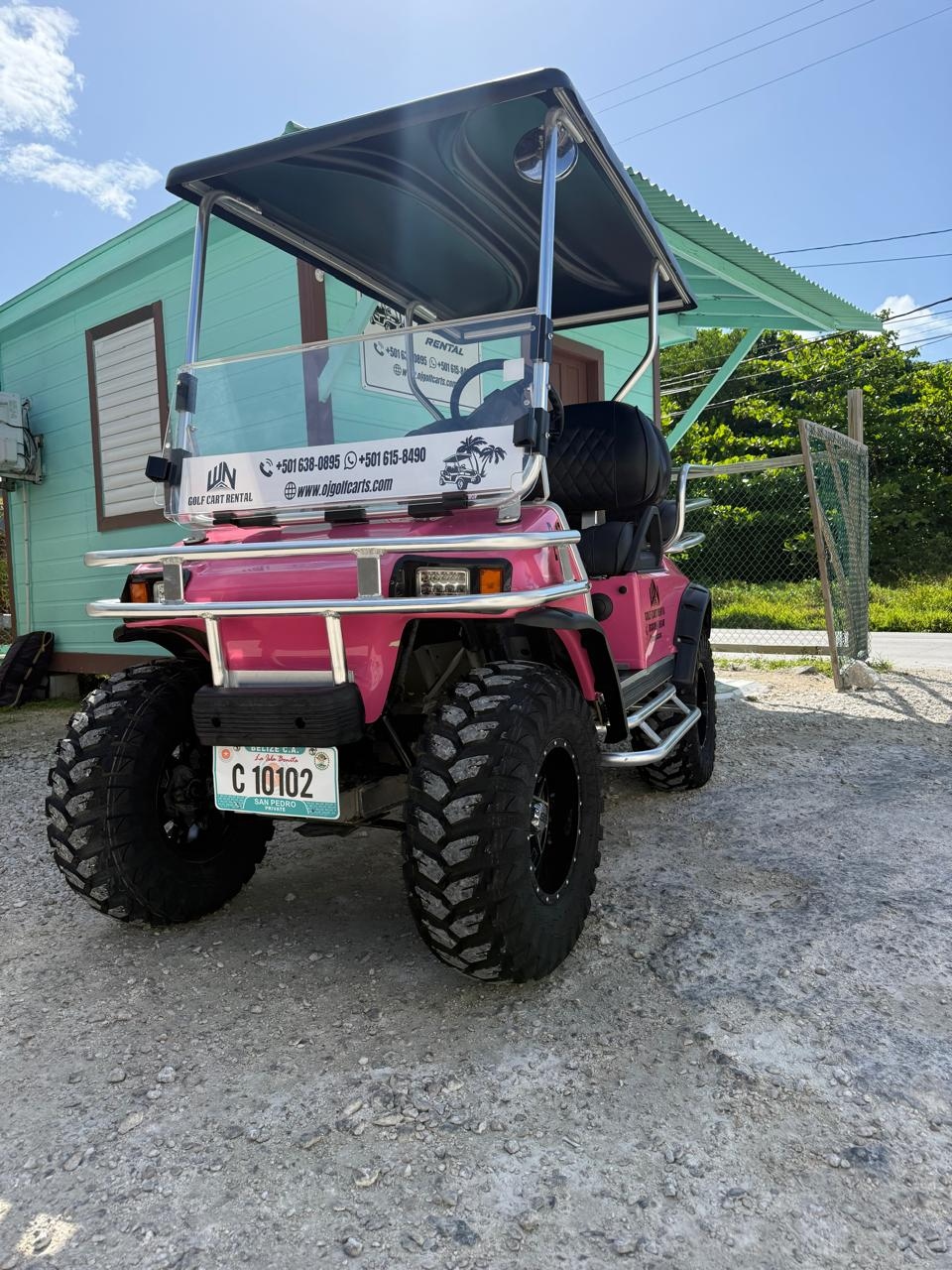 Hot pink 4-person golf cart rental San Pedro Belize