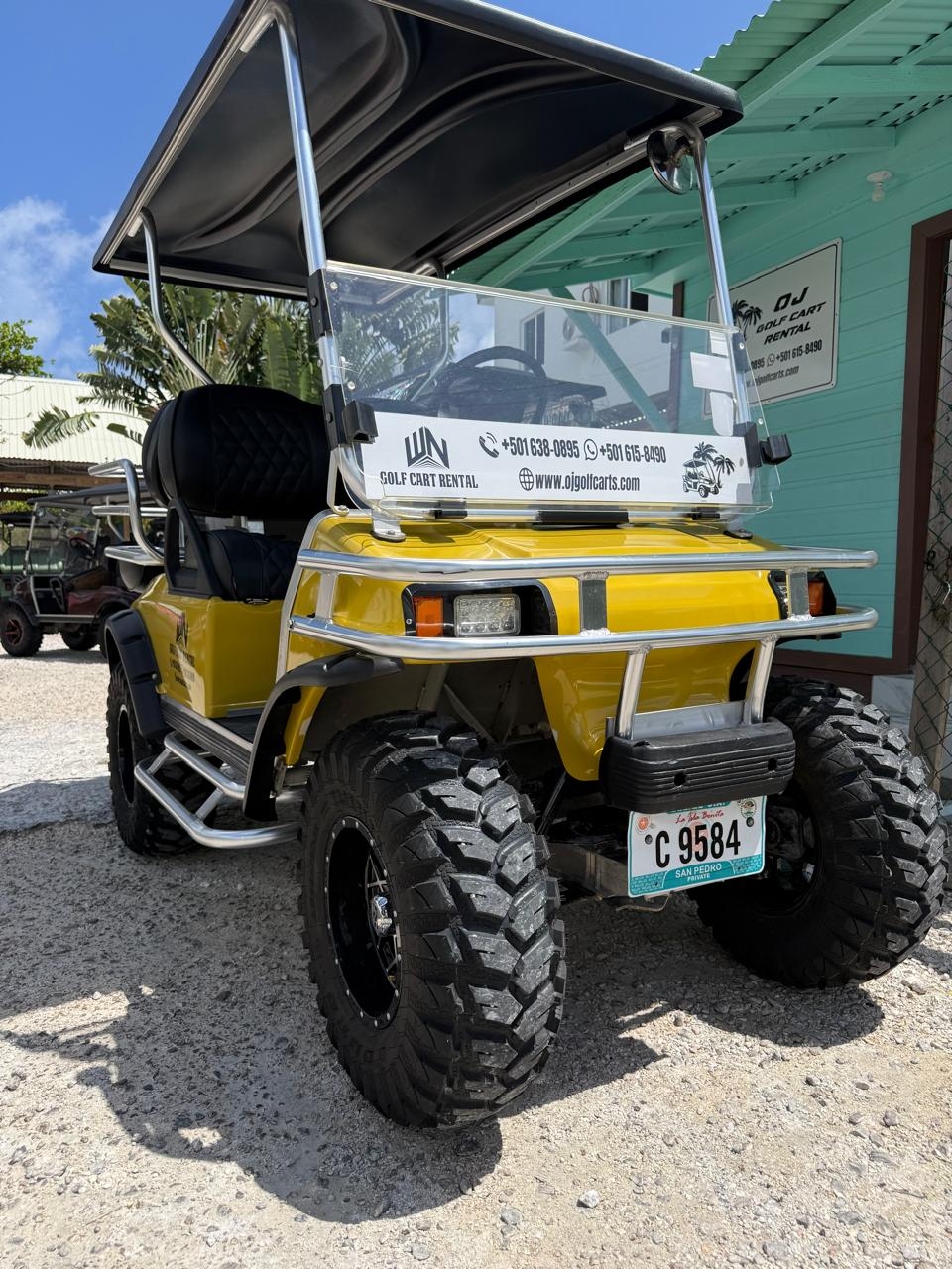 Yellow 4-person golf cart rental San Pedro Belize